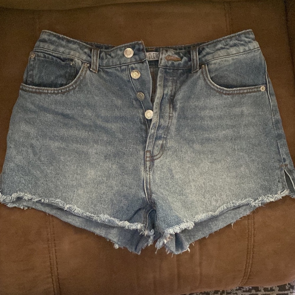 Fletch denim shorts with frayed edges. Size 28.